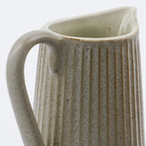 Pleat mjólkurkanna